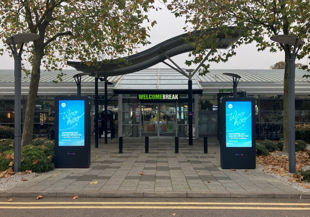 Example of Xero advertising on digital screens outside a Motorway Service Area in the UK
